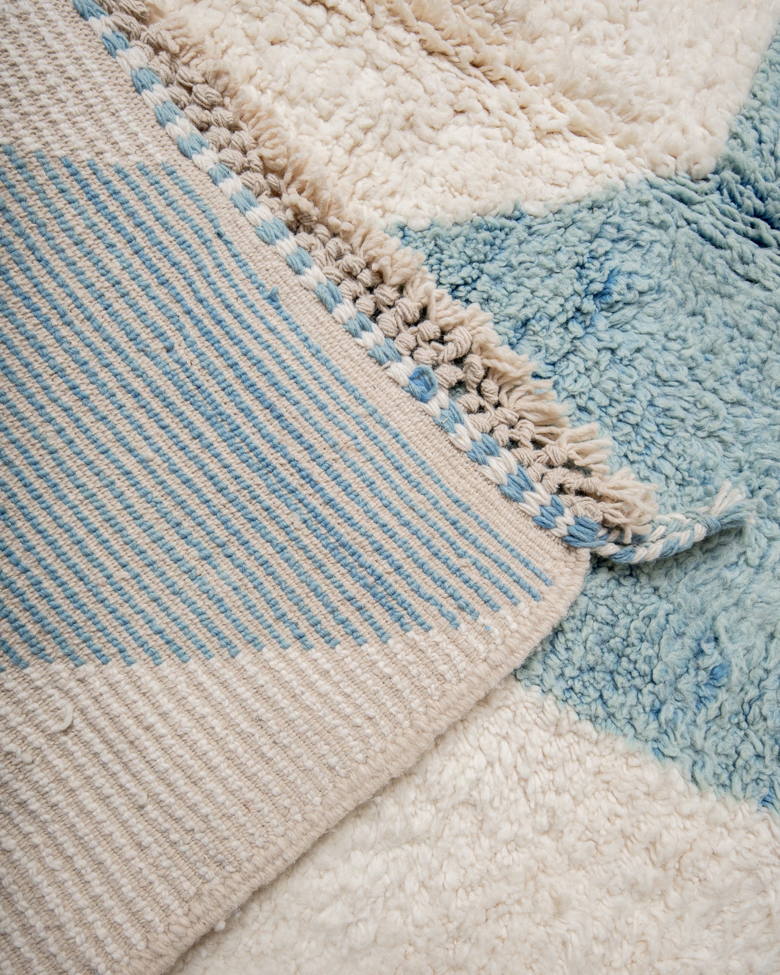 Modern, designer, handcrafted Berber rug from Morocco. Beniourain carpet with beautiful colours and patterns and fluffy wool texture.